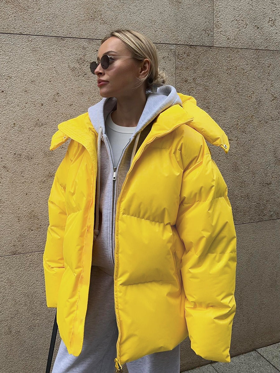 Damen lange Steppjacke mit Kapuze und Seitentaschen, Größen S–L