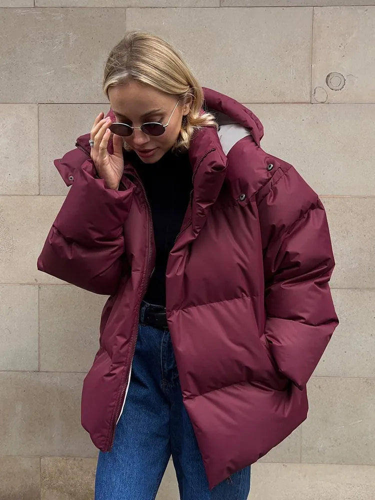 Damen lange Steppjacke mit Kapuze und Seitentaschen, Größen S–L