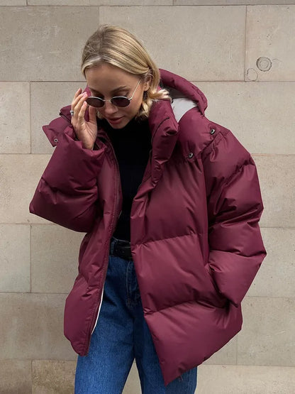 Damen lange Steppjacke mit Kapuze und Seitentaschen, Größen S–L