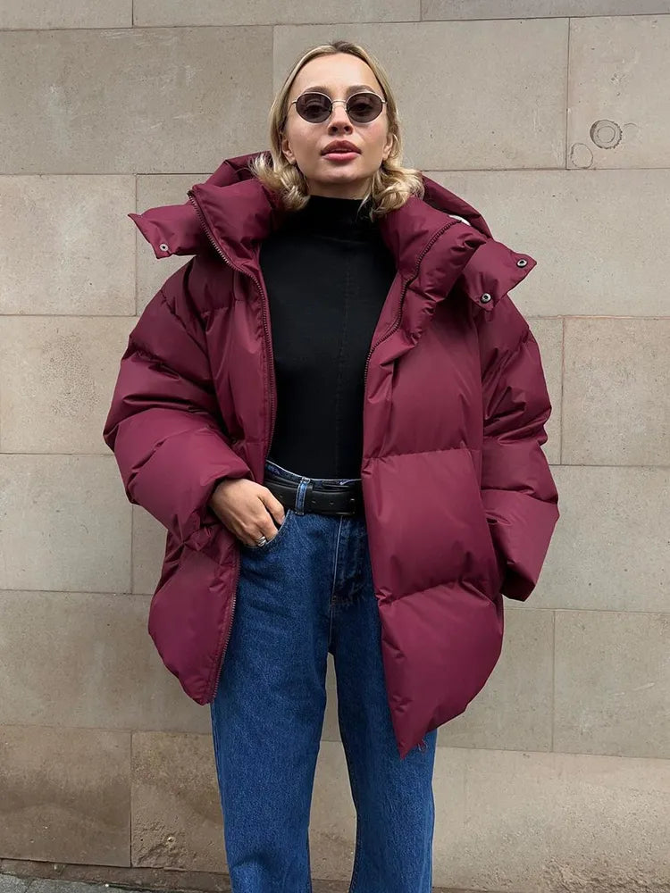 Damen lange Steppjacke mit Kapuze und Seitentaschen, Größen S–L