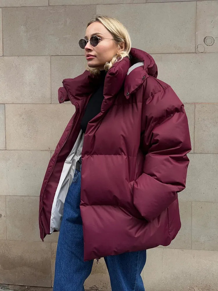 Damen lange Steppjacke mit Kapuze und Seitentaschen, Größen S–L