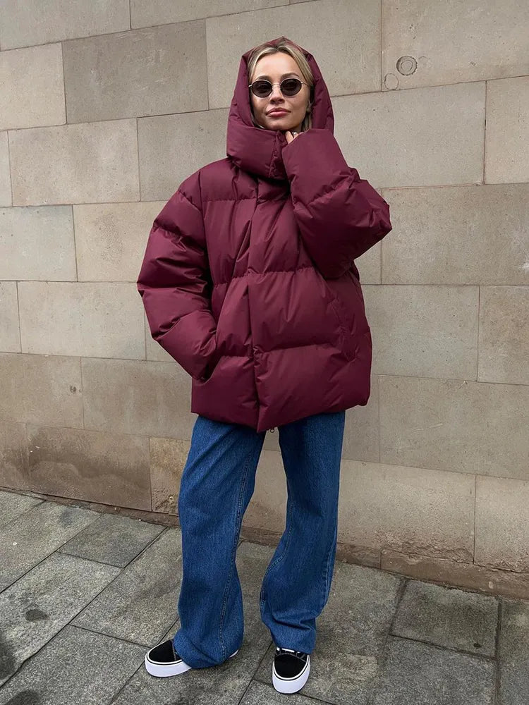 Damen lange Steppjacke mit Kapuze und Seitentaschen, Größen S–L