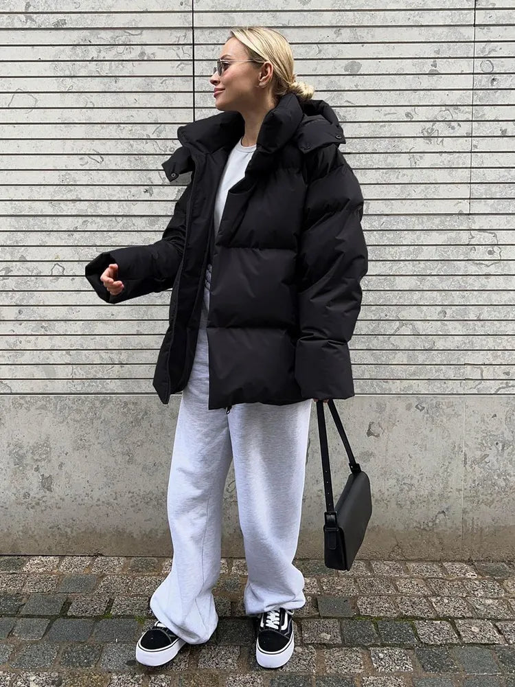 Damen lange Steppjacke mit Kapuze und Seitentaschen, Größen S–L
