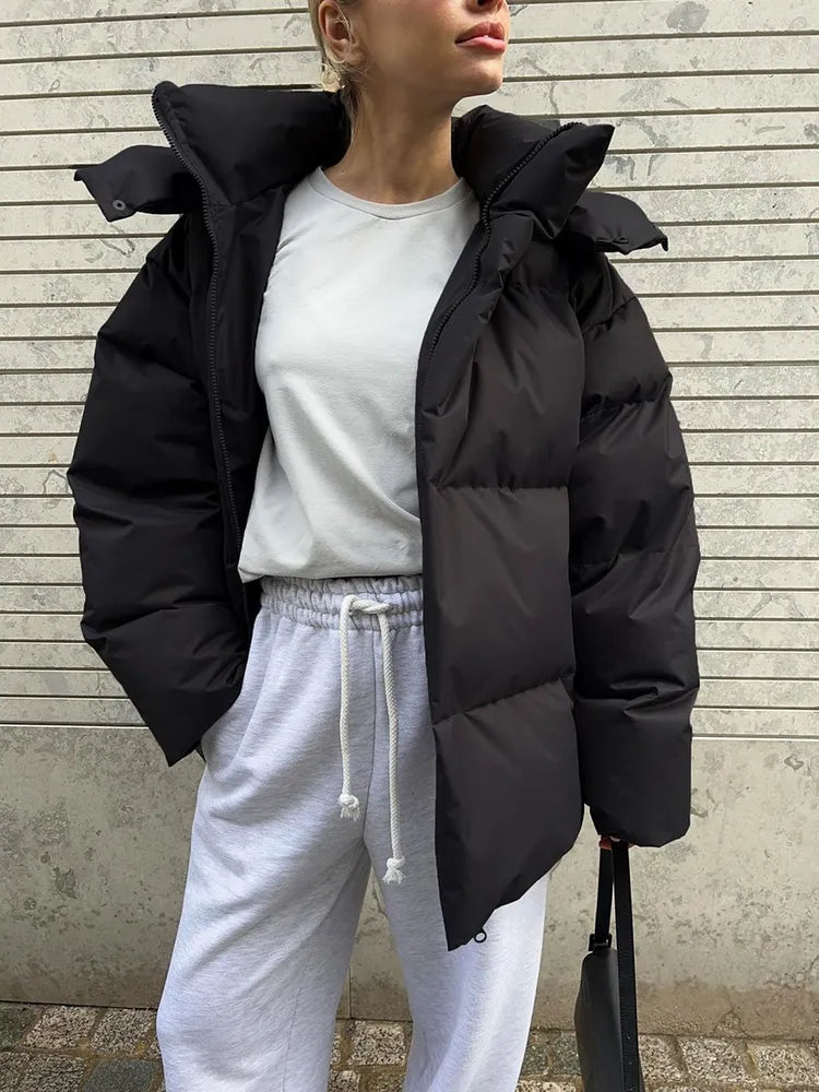 Damen lange Steppjacke mit Kapuze und Seitentaschen, Größen S–L