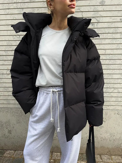 Damen lange Steppjacke mit Kapuze und Seitentaschen, Größen S–L