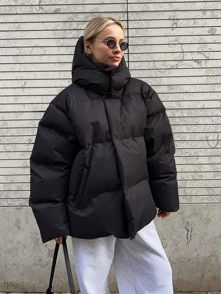 Damen lange Steppjacke mit Kapuze und Seitentaschen, Größen S–L