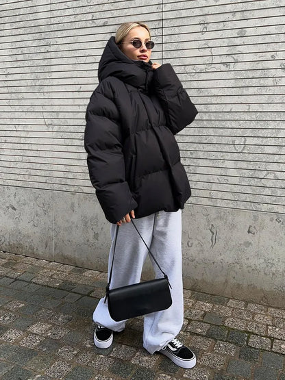 Damen lange Steppjacke mit Kapuze und Seitentaschen, Größen S–L
