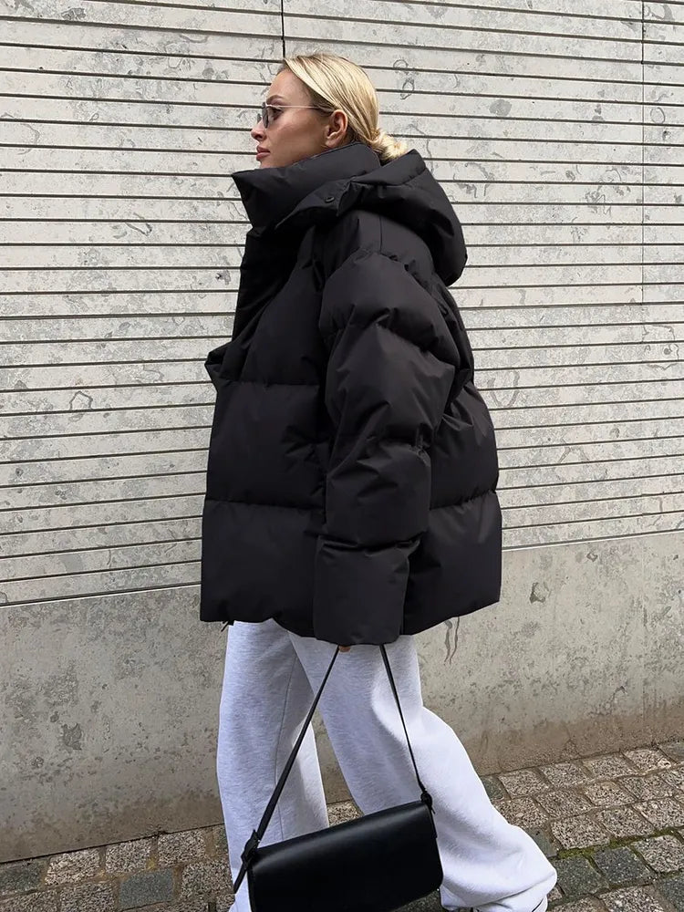 Damen lange Steppjacke mit Kapuze und Seitentaschen, Größen S–L