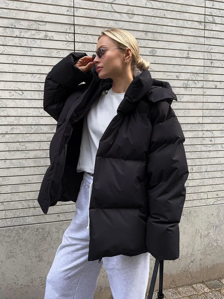 Damen lange Steppjacke mit Kapuze und Seitentaschen, Größen S–L