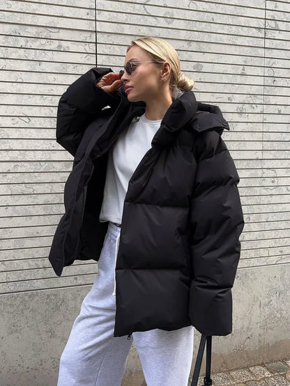 Damen lange Steppjacke mit Kapuze und Seitentaschen, Größen S–L