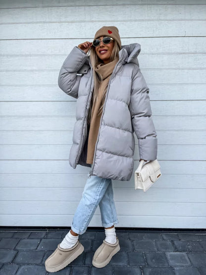 Damen lange Steppjacke mit Kapuze und Seitentaschen, Größen S–L