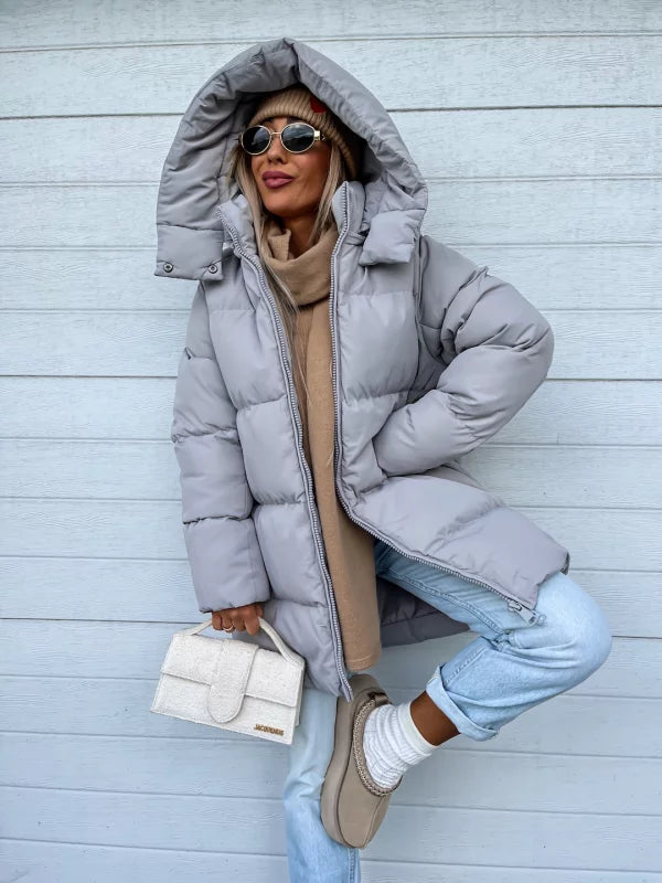 Damen lange Steppjacke mit Kapuze und Seitentaschen, Größen S–L